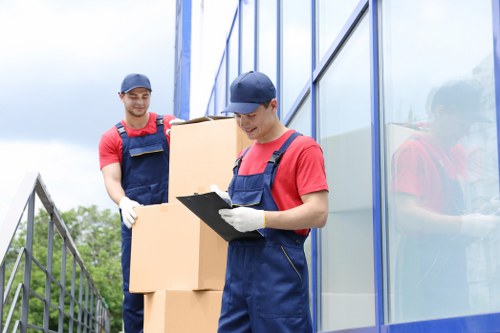 Man with van service loading boxes in Westhampstead