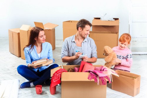 Professional removal van and moving boxes in Westhampstead