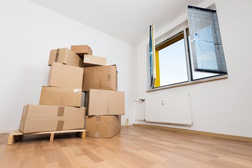 Securely stacked items inside a moving van with safety straps