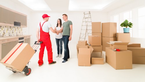 Local movers handling furniture during a Westhampstead relocation