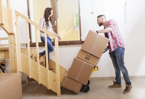 Moving team preparing for delivery and unloading in West Hampstead