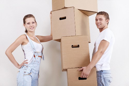Moving team handling furniture in a Westhampstead property