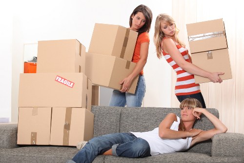 A commercial move in progress with labelled boxes and office items