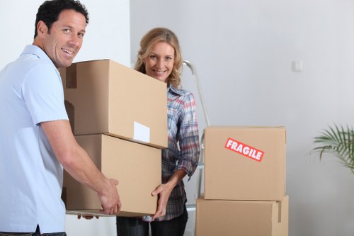 Staff preparing for an office relocation in Westhampstead with labeled boxes